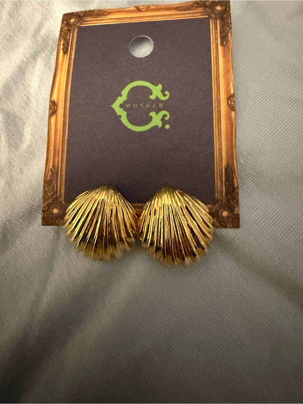 C. Wonder Gold Ribbed Shell post back Earrings